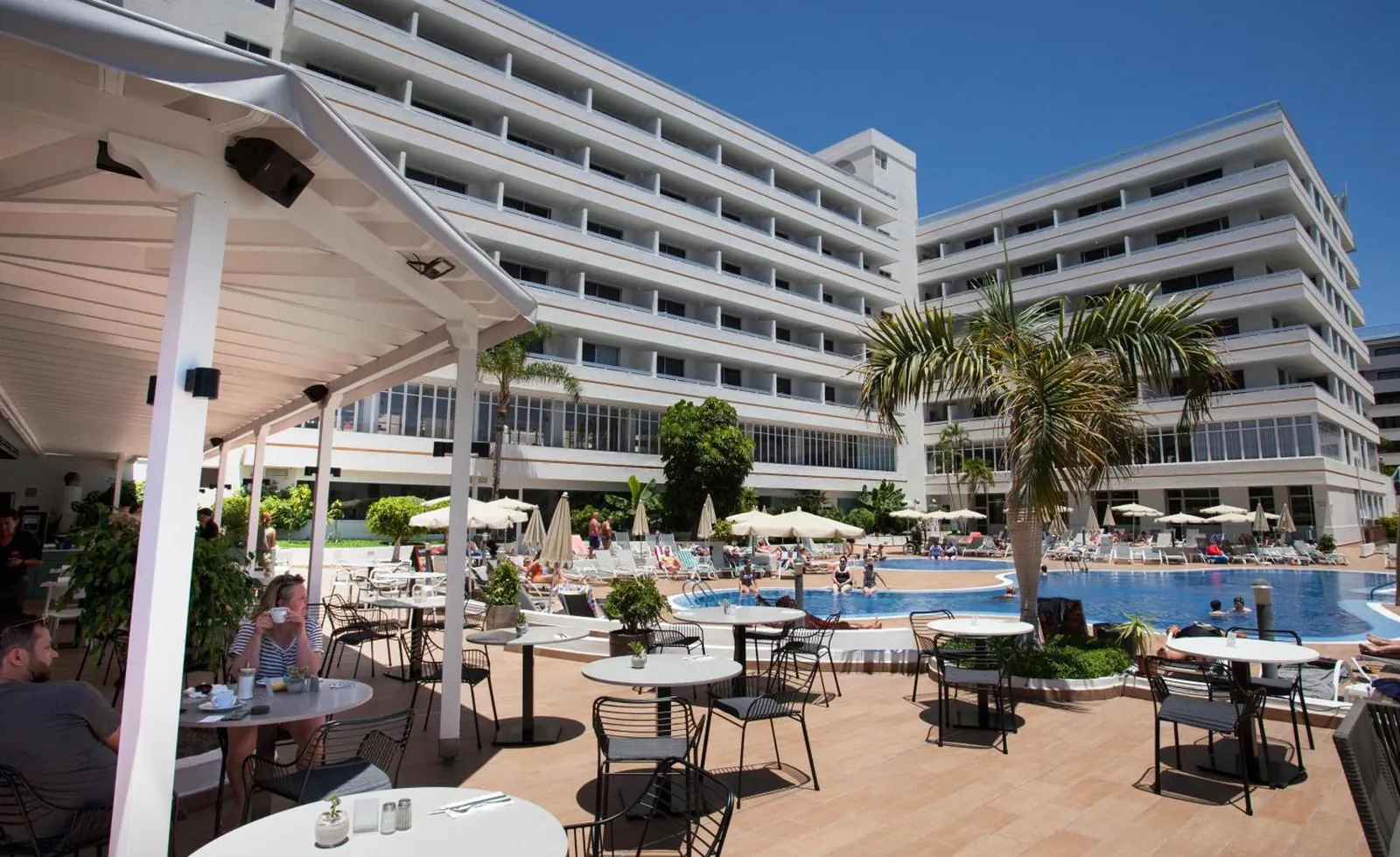 Poolside terrace and restaurant tables
