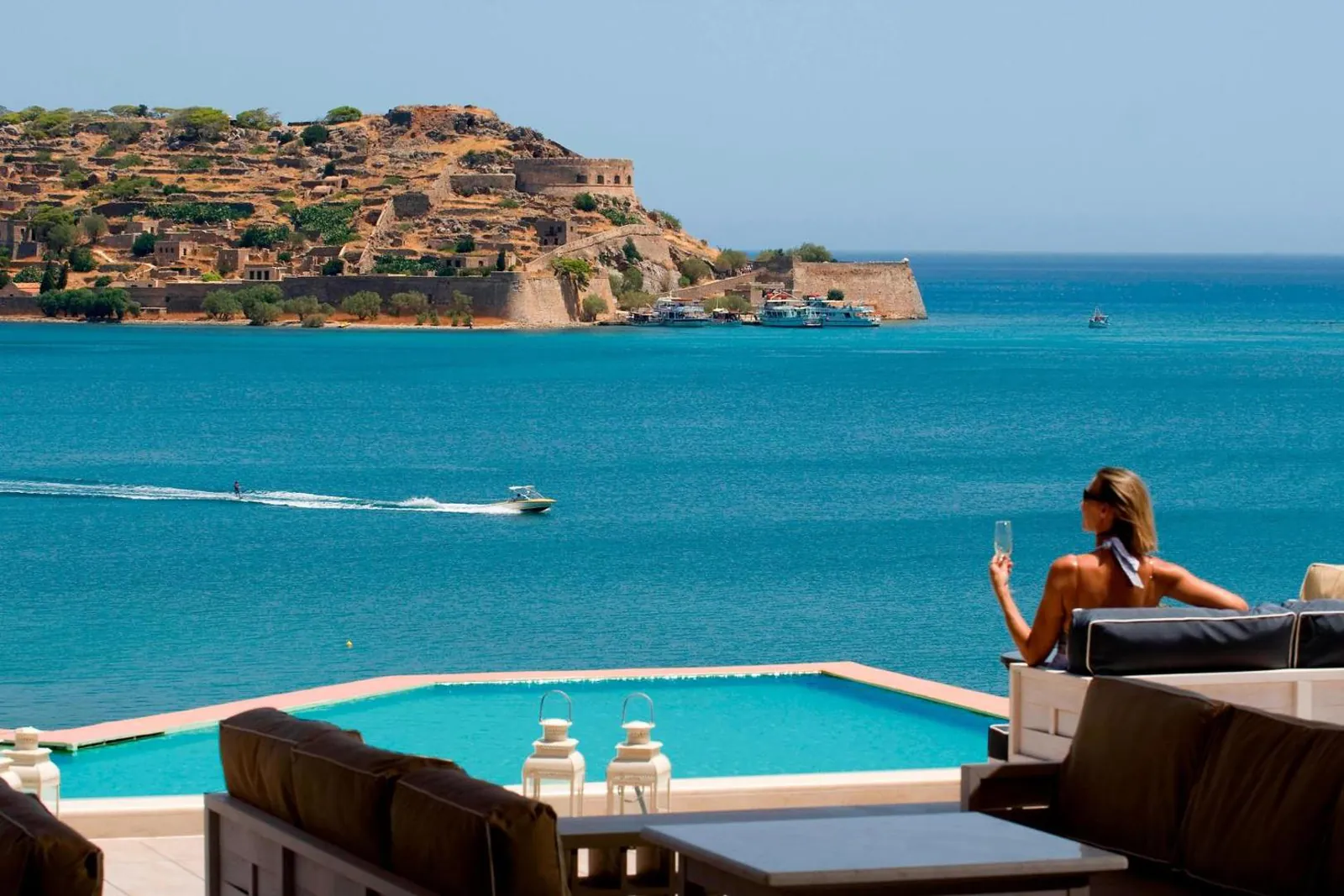 Pool terrace facing the island of Spinalonga across turquoise water