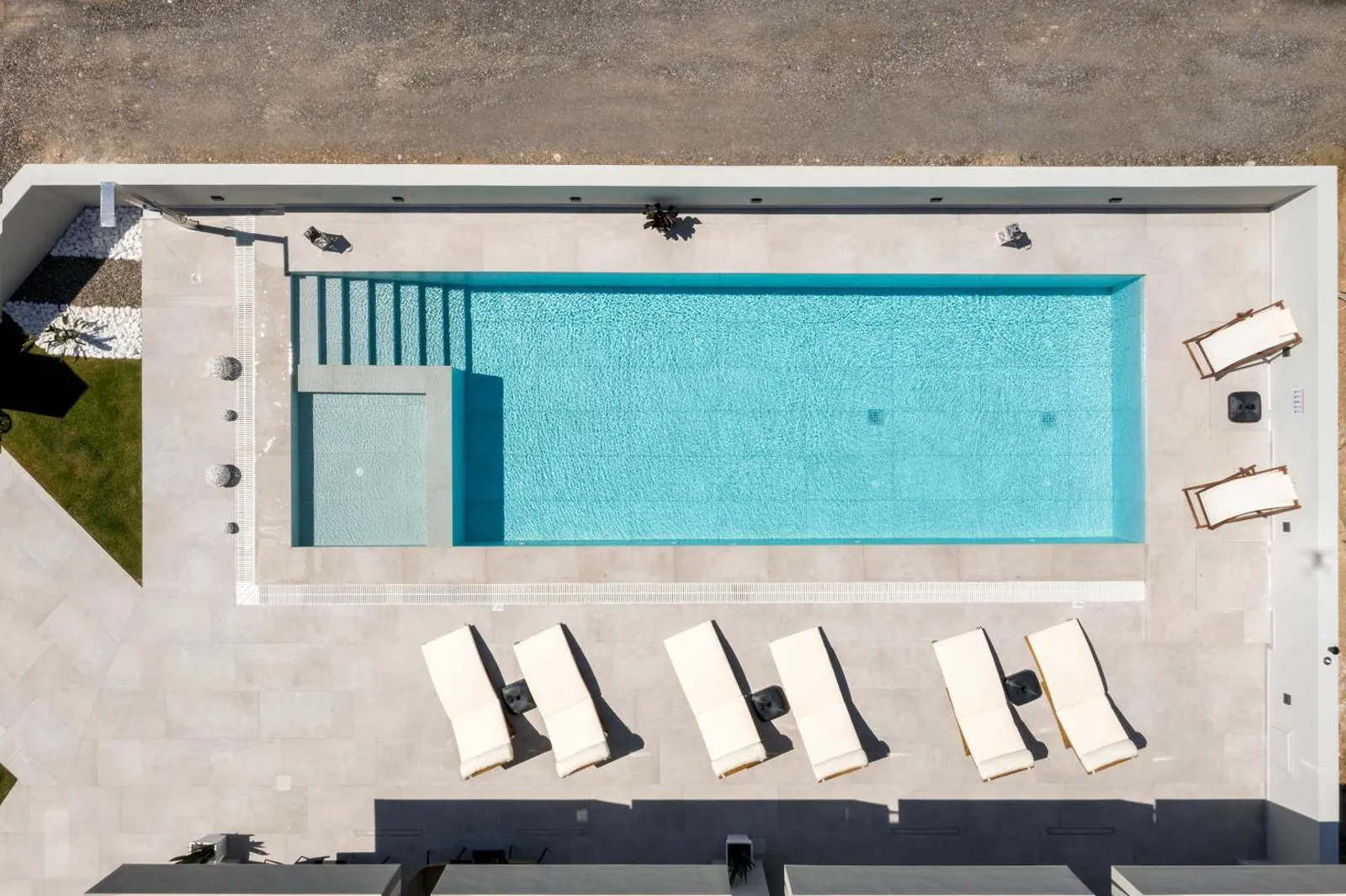 Aerial view of the rectangular pool and row of sun loungers