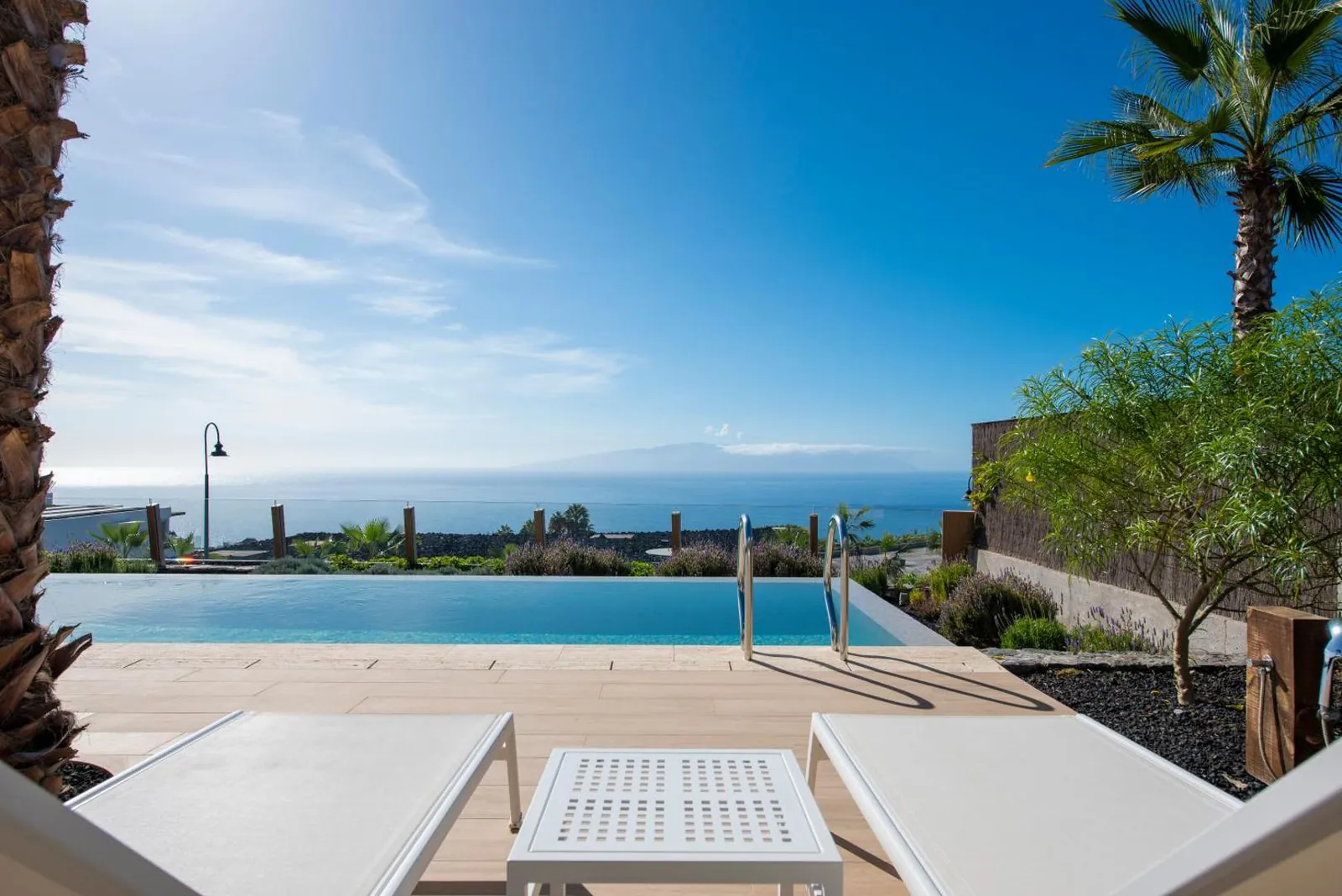 Private villa pool with an infinity edge facing the sea
