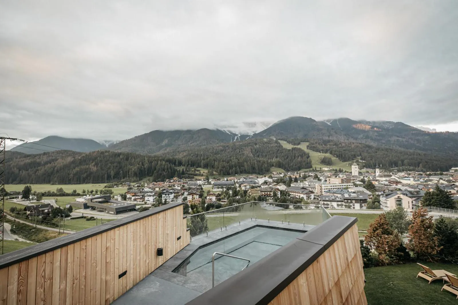 Rooftop whirlpool of the spa at Naturhotel Leitlhof looking across the Pusteria valley